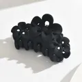 Elegant matte black flower shaped hair claw clip for women's stylish half-up hairstyles - Hollow Flower / Black