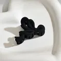 Medium-sized matte black ribbon bow hair claw clip for elegant women's hairstyles - Streamer Style / Black
