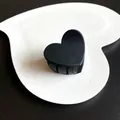 Matte black heart-shaped hair claw clip for elegant half-up hairstyles. - Heart Style / Black
