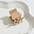 Medium-sized matte hair claw clip in latte beige for elegant half-tie hair styles - Claw Clip Style / Khaki