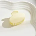Elegant medium pale yellow matte oval hair claw clip for women's versatile hairstyles - Oval / White