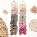 Set of 20 small grosgrain ribbon bow hair ties in assorted solid colors for girls - Style 20D
