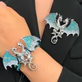 Vintage blue enamel dragon bracelet set with silver finish and turquoise woven cord accents - Bracelet and Brooch Set / Blue
