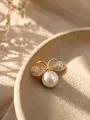 Elegant gold bee brooch featuring a large white pearl and sparkling crystal-encrusted wings - Bee Pearl Style (XZ0035)