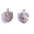 Retro antique silver alloy shield charm featuring a cross relief for DIY jewelry designs - Embossed Shield (A7-314) / 21*14mm / Antique Silver