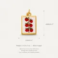 Detailed view of square 18K gold plated copper pendant with embroidered red tomato branch design - Tomato Vine Pendant