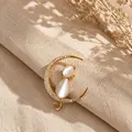 Elegant gold-plated crescent moon and cat brooch featuring white cat eye stones - Cat and Moon Cat's Eye Style (BH22)
