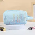 Light blue large capacity cosmetic bag with colorful wavy embroidery - Blue