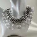 Detail view of a chunky silver-toned chain necklace with elegant dangling white pearls - Silver Punk Artificial Pearl Chunky Chain Style (33663-nek-S-EP)