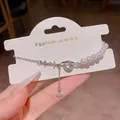 Elegant pearl bracelet with zircon saturn and star charms in silver finish - Saturn Zirconia Half Pearl Half Chain Style