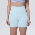 Close-up of light blue high-waisted yoga shorts featuring tummy control design - S / Cherry Blossom Pink