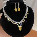 Luxe sieradenset met gele waterdruppelstenen en bijpassende ketting - Ketting En Oorbellen Set / Geel