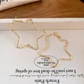 Elegant gold star-shaped metal hoop earrings with a minimalist design for women - Star Shaped Large Hoop (57# 925 Sterling Silver Earring Post) / Gold