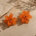 Elegant translucent orange flower petal stud earrings featuring delicate golden stamen details - Orange Translucent Flower with Gold Stamen Style (E6130-3)