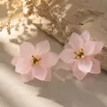 Elegant matte pink flower stud earrings with gold centers on natural stone background - Pink 3D Layered Flower Stud Earrings (E6001-1)