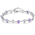 Elegant silver plated heart bracelet featuring faceted purple crystals and delicate heart links - Heart Bracelet / Purple Zirconia