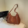 Stylish brown large capacity shoulder bag with double straps and tassel zippers - Brown