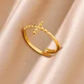 Macro detail showing the beaded cross design of an 18K gold plated stainless steel ring. - Bead Point Cross Style (10)