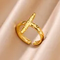 Detailed view of 18K gold plated stainless steel open ring with textured finish on silk fabric - Hammered Wave Style (11)