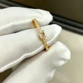 Elegant gold ring with rectangular emerald-cut stone and pavé diamond band - US Size 5 / Gold
