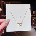 Elegante Halskette aus Titanstahl im koreanischen Stil mit doppeltem Herzanhänger - Doppelherzstil (X025) / Gold
