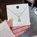 Elegante Titanstahl-Halskette mit funkelndem runden Anhänger in Silber-Finish - Runder Halo-Strass-Stil (X180) / 18K-Gold / Silber