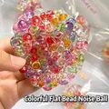 Jouet anti-stress rond et transparent rempli de perles plates colorées et vibrantes - Balle Fidget Colorée