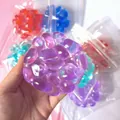 Jouet anti-stress DIY mou violet translucide avec une texture mochi à rebond lent - Balle Fidget Pierre Précieuse Violet