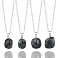 Juego de cuatro collares con colgantes de piedra natural irregular y cadena plateada. - Larvikita