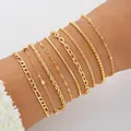 9-teiliges Set minimalistischer goldener Schichtarmbänder mit eleganten Kettendesigns - 9-teiliges Goldenes Minimalistisches Mehrfach-Armband-Set (6410401HB) / 9er Set / Gold