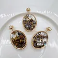 Oval gold-framed pendants with crushed natural tiger eye stones and faceted glass - Tiger Eye