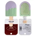 Cute popsicle-shaped air cushion hair brush in pastel purple and green for kids - Card Pack / Green