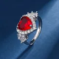 Detailed macro view of heart-shaped red garnet ring with sparkling crystal halo - Red Adjustable Ring (TZ-17)