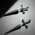 Detailed macro shot of gothic sword shaped stud earrings with emerald green rhinestones - Cross Sword Stud Earrings (1 Pair) / Blue Rhinestone