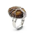 Detail view of a silver wire-wrapped tree of life ring with an oval tiger eye stone. - Adjustable Open / Tiger Eye Stone Bracelet