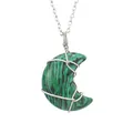 Close-up of handmade wire-wrapped green malachite-style crescent moon necklace - Synthetic Malachite