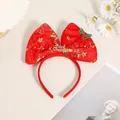 Diadema festiva con lazo de felpa roja, estrellas doradas y acebo para Navidad. - Diadema de Lazo de Estrella Roja