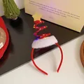 Diadema festiva de árbol de Navidad rojo con luces LED de colores y estrella oro - Resorte Rojo con Luz