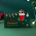 Dark green Christmas greeting card featuring a gingerbread man in a stocking design - Christmas Sock