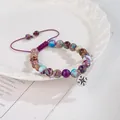 Detailed view of colorful natural stone beads and compass charm on adjustable bracelet - Compass (Woven Style) / Adjustable
