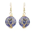 Close-up of handmade tree of life wire-wrapped round blue natural stone earrings - Gold & Lapis Lazuli