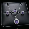 High quality macro detail of purple oval gemstone jewelry set presented in a black leather box - 3-Piece Set (T16) / Purple