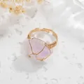 Macro view of a handmade wire-wrapped ring featuring an irregular purple stone - Adjustable Open / Light Amethyst