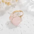 Detailed view of handmade gold wire wrapped ring with irregular pink raw stone - Adjustable Open / Rose Quartz