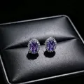 Detailed view of elegant purple oval halo stud earrings on black textured jewelry box - Earrings (T16) / Purple
