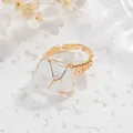 Exquisite handmade gold wire-wrapped ring featuring an irregular natural raw clear crystal stone - Adjustable Open / White Crystal