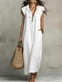 Elegant white bohemian maxi dress featuring delicate ruffle sleeves and a flowing floor-length hem - S / Dresses / White