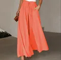 Elegant high waisted orange palazzo pants with drawstring elastic waist shown on model - Orange