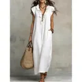 Elegant white Bohemian floor-length maxi dress with flutter sleeves and ruffle neck - S / Dresses / White