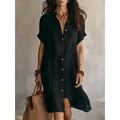 Chic black short sleeve button down shirt dress in midi length for a relaxed summer style - S / Dresses / Black